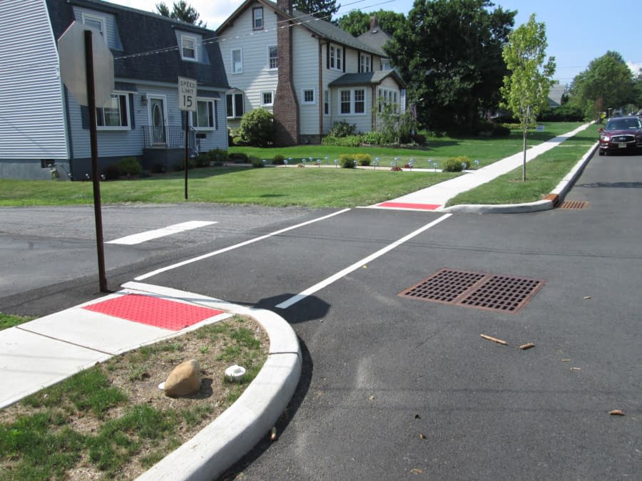 Grand Ave Sidewalk & Curbing - Intersection of new curbing & sidewalk